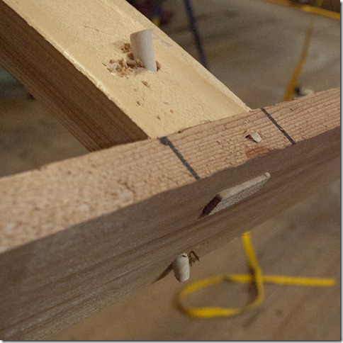 There are two pegs holding each deck rail in place. A 1/8" through the top, and a 1/4" on a diagonal. This is a strong joint (and no glue). There are two pegs holding each deck rail in place. A 1/8" through the top, and a 1/4" on a diagonal. This is a strong joint (and no glue).