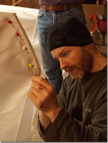Finishing the stern. We sewed just about an inch along the top so that we could hook this back over the end of the boat when tensioning Finishing the stern. We sewed just about an inch along the top so that we could hook this back over the end of the boat when tensioning