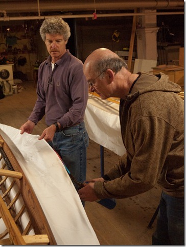 Dave and Steve sealed the edges of the fabric with a torch. Dave and Steve sealed the edges of the fabric with a torch.